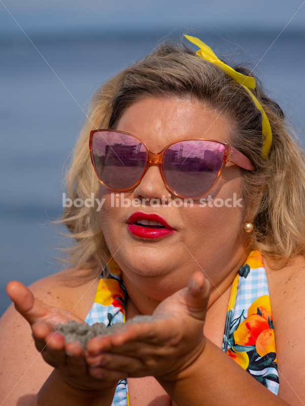 Body-Positive Stock Photo: Plus Size Woman Holds Sand in Front of the Ocean - It's time you were seen ⟡ Body Liberation Photos
