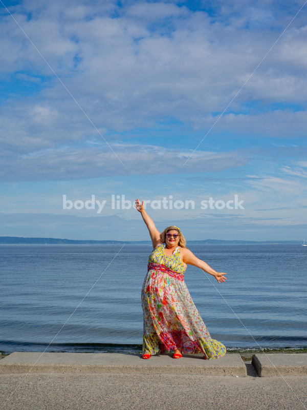 Body-Positive Stock Photo: Plus Size Woman with Arms Spread Cheerfully - It's time you were seen ⟡ Body Liberation Photos
