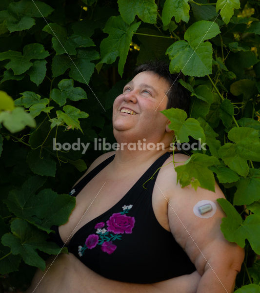 Health at Every Size Stock Photo: Diabetic Woman and Grapevine - It's time you were seen ⟡ Body Liberation Photos