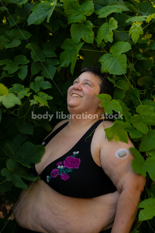 Health at Every Size Stock Photo: Diabetic Woman and Grapevine - It's time you were seen ⟡ Body Liberation Photos