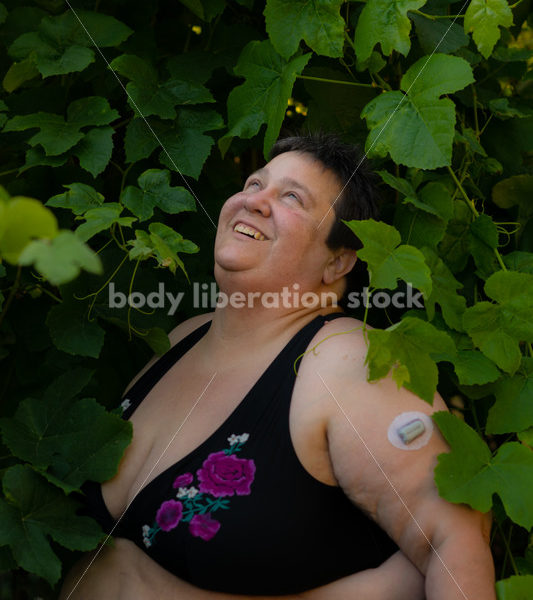 Health at Every Size Stock Photo: Diabetic Woman and Grapevine - It's time you were seen ⟡ Body Liberation Photos