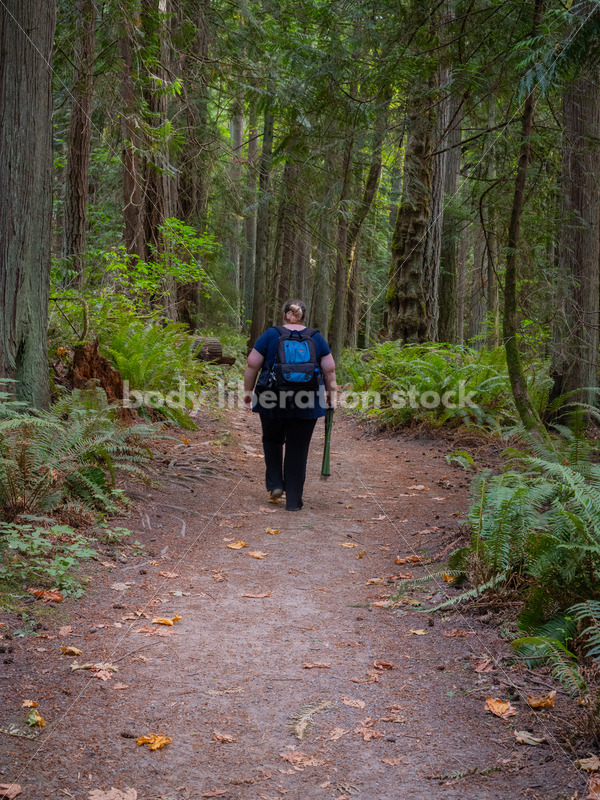 Plus Size Woman Hikes on a Trail in the Woods Carrying a Stool (further) - It's time you were seen ⟡ Body Liberation Photos