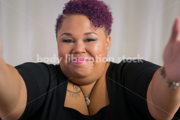 Royalty Free Stock Photo: Confident, Body Positive Black Woman Offering Hug - Body Liberation Photos & Stock